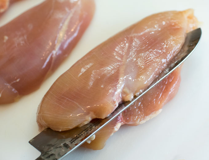 Slicing chicken breast lengthwise