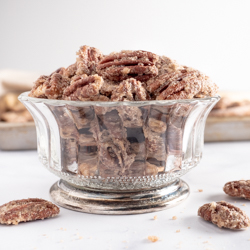 candied pecans in a glass bowl